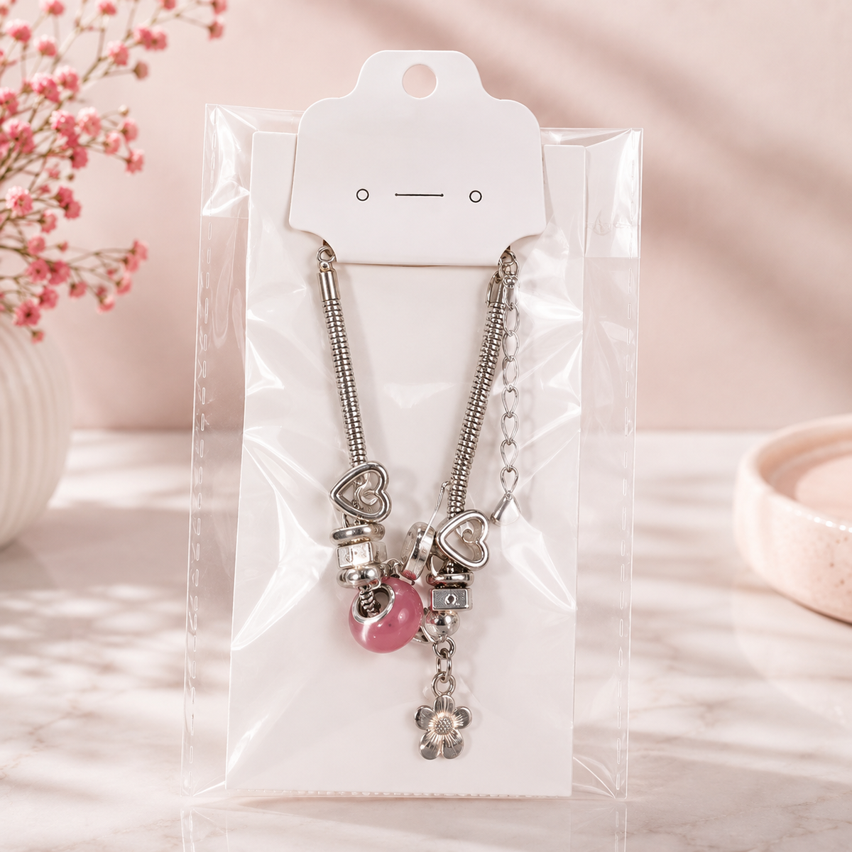 Pulsera con Dijes Plateada